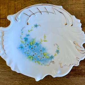 vintage hand painted dish. floral decoration with gold accents