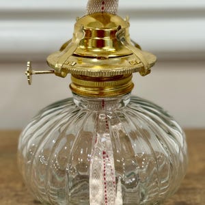 Vintage Markenzeichen Golden Globe Glaslampe mit geripptem Sockel und Brenner