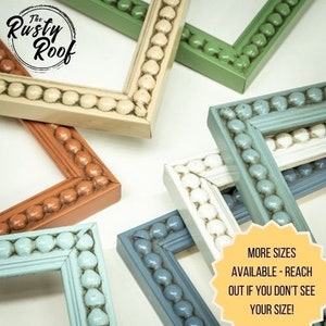 May include: Assortment of picture frames with beaded edges in various colors, including white, blue, green, and orange. The frames are arranged on a white surface. The text "The Rusty Roof" is visible in the top left corner. The text "MORE SIZES AVAILABLE - REACH OUT IF YOU DON'T SEE YOUR SIZE!" is visible in the bottom right corner.