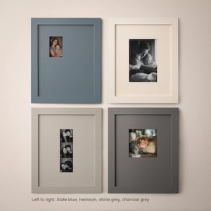 four framed photographs arranged in a grid on a wall.