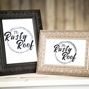 May include: Two ornate picture frames, one black and one gold, both with the same logo: "The Rusty Roof" in a circle with a grunge effect.