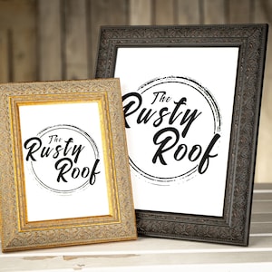 May include: Two ornate picture frames, one gold and one black, both displaying a white background with a black circle and the text "The Rusty Roof" in a stylized font.