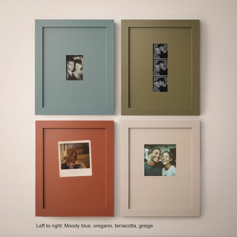 four framed photographs arranged in a grid on a wall.