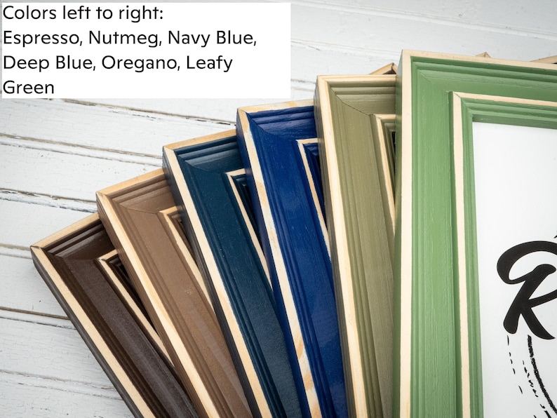 a group of framed pictures sitting next to each other