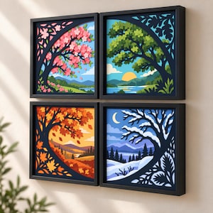 Puede incluir: Un conjunto de cuatro piezas de arte mural cuadradas en marcos negros, cada una con un diseño de papel recortado en capas que representa una estación diferente: primavera con flores rosas, verano con árbol verde y sol, otoño e invierno con nieve.