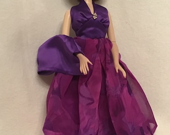 Gene wearing Purple and Fushia Mid calf Cotillion Dress