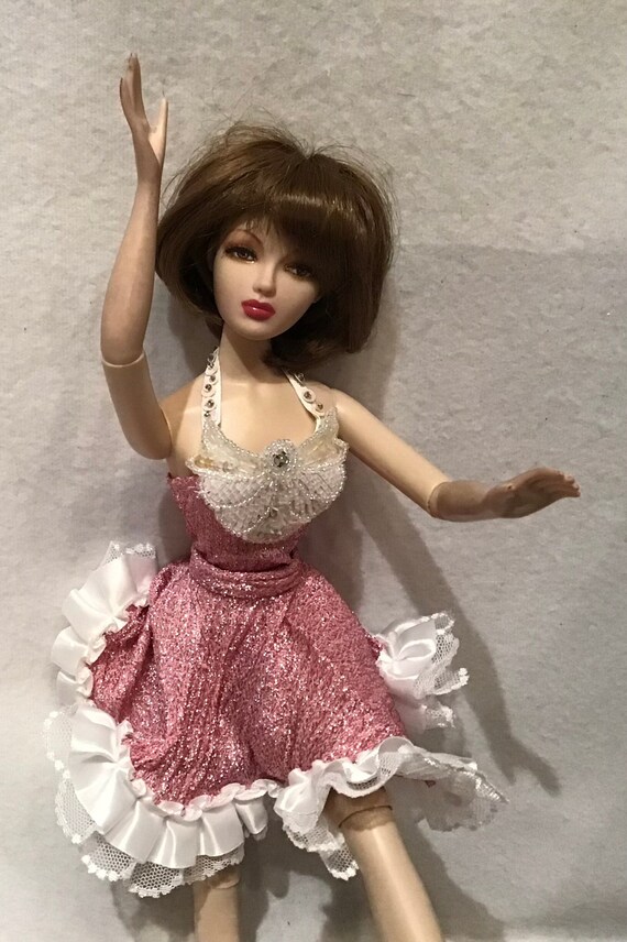 Gene in a Pink Sparkle Show Girl Outfit