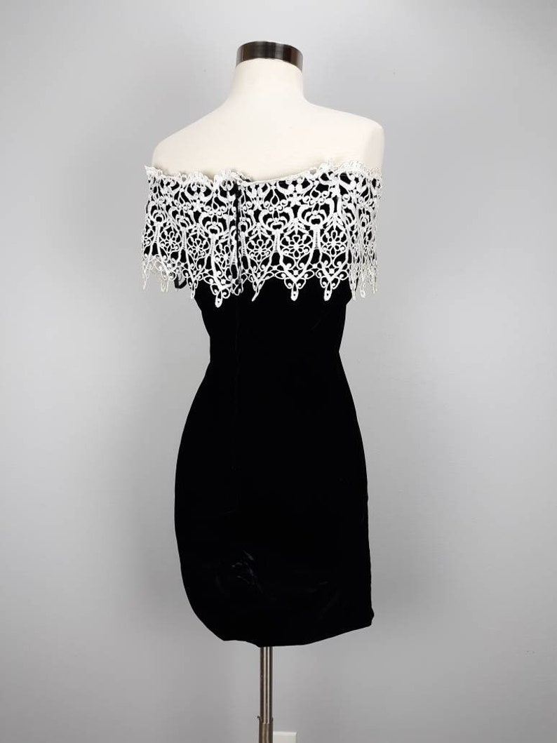 Vintage black velvet off the shoulder mini dress with white embroidered lace trim