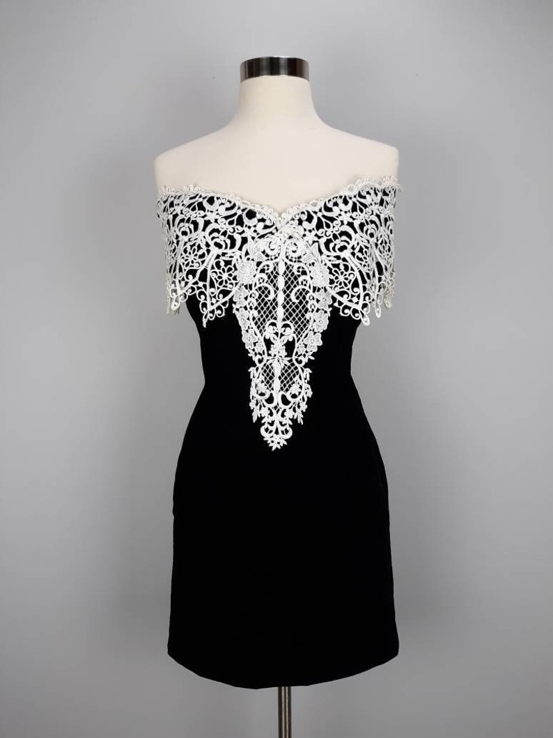 Vintage black velvet off the shoulder mini dress with white embroidered lace trim