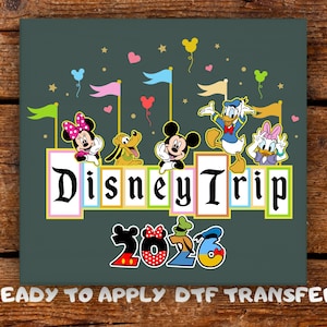 May include: A dark teal graphic featuring Disney characters Minnie Mouse, Pluto, Mickey Mouse, Donald Duck, and Daisy Duck. The words "Disney Trip 2026" are displayed with decorative elements. The phrase "READY TO APPLY DTF TRANSFER" is at the bottom.