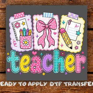 May include: A colorful graphic design featuring the word teacher in bubble letters with various patterns. Above the text are three scalloped-edge note cards decorated with a pink bow, a pencil, a notepad, and a cup of crayons, all accented with stars.