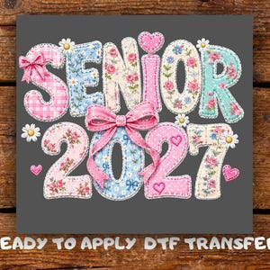 May include: A DTF transfer design featuring the word SENIOR and the year 2027 in a patchwork style. The letters and numbers are decorated with pink gingham, blue floral, and rose patterns, accented by a large pink bow, small hearts, and daisies.