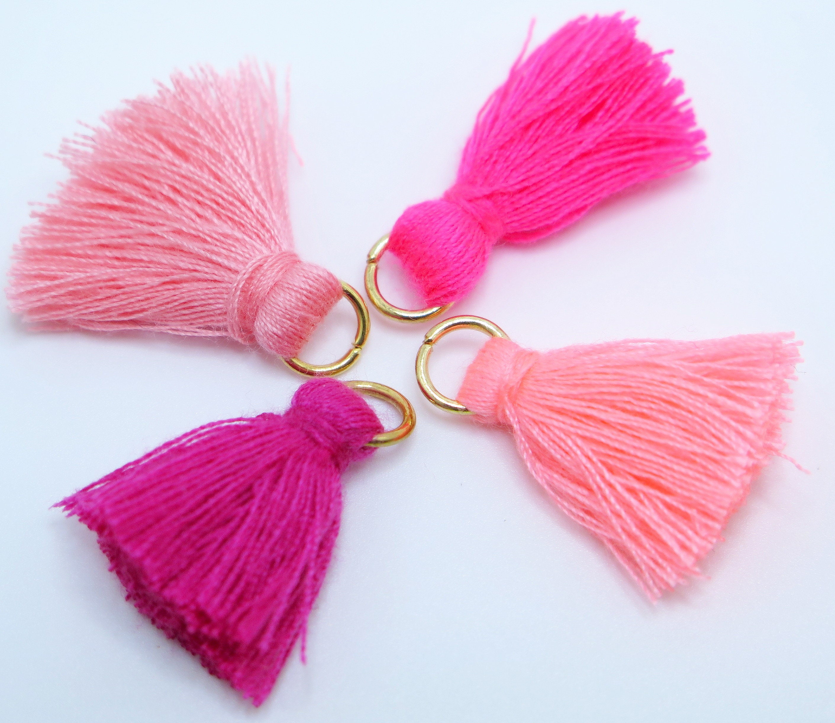 pink tassel mules