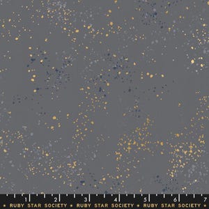 May include: Gray fabric with a speckled pattern of gold and navy blue dots. The fabric has a subtle, textured appearance. The words "RUBY STAR SOCIETY" are printed along the bottom edge.