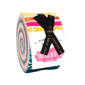 May include: A rolled bundle of colorful fabric strips, featuring a variety of patterns and colors including pink, yellow, and teal. The bundle is secured with a black ribbon and a white label with text that reads "WASH PLUS".