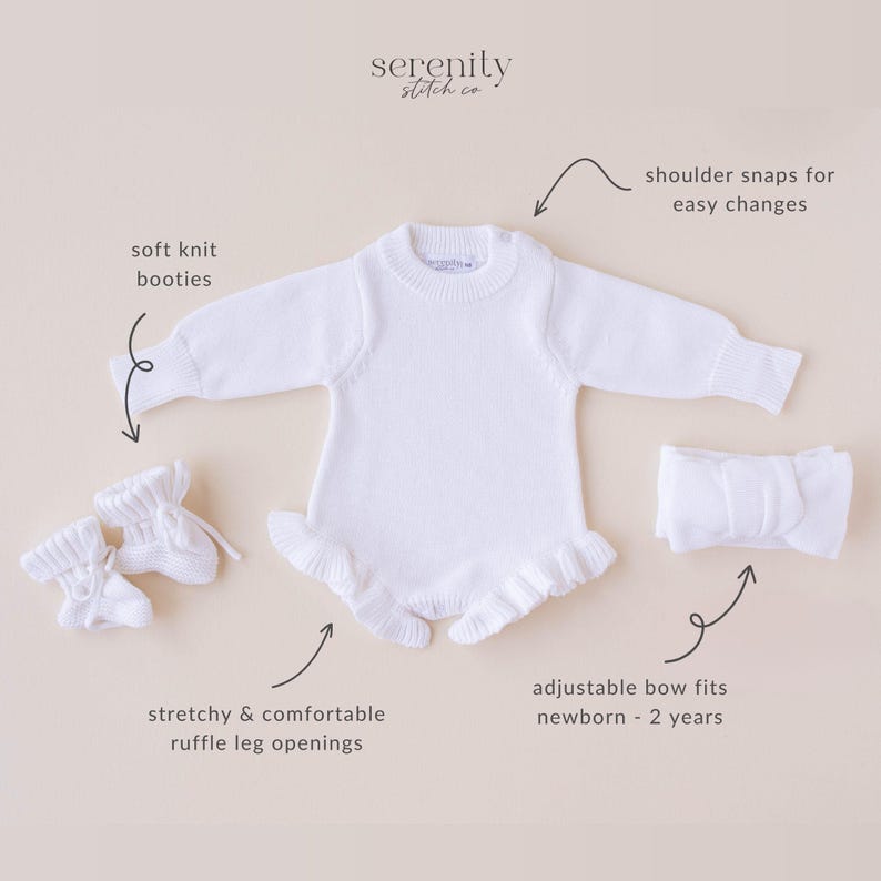 May include: White baby romper with ruffle leg openings, soft knit booties, and a matching bow. The romper features shoulder snaps for easy changes. The bow is adjustable and fits newborns to 2 years old.