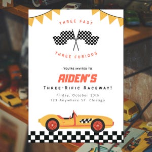 May include: A yellow race car invitation with black and white checkered flags and a matching border. The text reads "THREE FAST, THREE FURIOUS, You're invited to Aiden's Three-Rific Raceway!" with date and address.