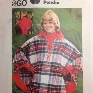 May include: A vintage sewing pattern for a reversible poncho. The pattern is for sizes 6, 8-10, 12-14, and 16-18. The pattern is called "The Reversible Poncho" and is from Butterick pattern number 3825. The pattern is for a plaid poncho with a red and white checked design.