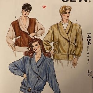 May include: A sewing pattern for a jacket with three different styles. The pattern is called "Kwik Sew" and the pattern number is 1454. The pattern is for sizes XS, S, M, and L.