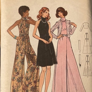 May include: A vintage sewing pattern for three different dress styles. The pattern is for size 10, bust 32 1/2 inches. The pattern includes a long, flowing dress with a side slit, a short, black dress with a halter neck, and a jumpsuit with a floral print. The pattern is from Butterick and is labelled "The Fashion One" and "House of Textiles".
