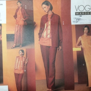 May include: A sewing pattern for a dress and a top. The pattern is from Vogue Wardrobe and has a number 2673. The pattern shows three different styles of clothing, all in shades of orange and brown.