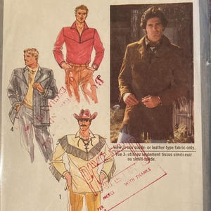 May include: Simplicity pattern 9123 for men's clothing. The package shows illustrations of outfits, including a red shirt, a brown suede jacket, and a fringed shirt. The pattern includes the text "MEN" and "HOMME".