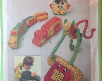 Vintage Sewing Pattern Colourful Stuffed Toys Retro 1970's Monkey Telephone Train Clock Truck Calico Cotton Uncut