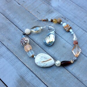 Sun catcher decoration.  Magnesite Window charm. Gemstones. White. Brown.  handmade beaded gift.