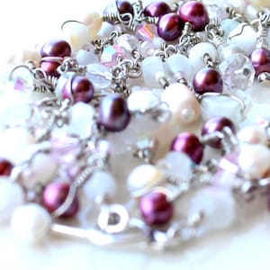 fields of raspberry pearls. bracelet. layered. white moonstone and assorted beads wire wrapped.
