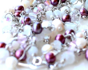 fields of raspberry pearls. bracelet. layered. white moonstone and assorted beads wire wrapped.