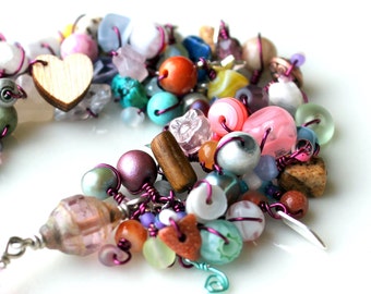 easter bracelet. pastel paradise handmade beaded wire wrapped star heart charms bracelet fringe jewelry