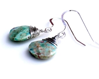 teardrop earrings. gemstone earrings.  sterling wrapped green with specks of purple