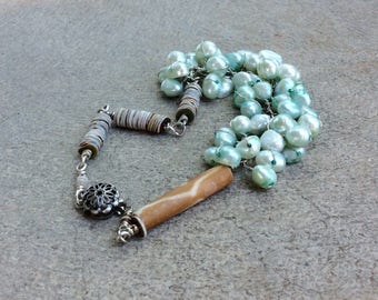 Teal Pearl chain wrapped bracelet. heishi seashells.  Feminine gift