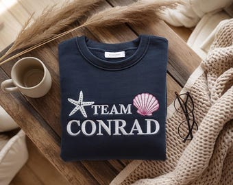 Embroidered Team Conrad Unisex shirt, TSITP shirt, Team Conrad shirt, Shell and Starfish Design Coastal Aesthetic Summer Crewneck