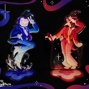 May include: Two acrylic standees of cartoon characters. One is blue with a white face and a suit, the other is red with a yellow tie and a suit. Both are on cloud-shaped bases. The background is black with stars and colorful swirls.