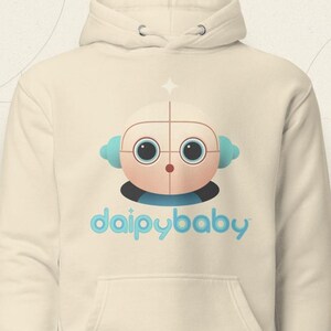 May include: A cream-colored hoodie with a blue robot cartoon and the text "daipybaby" on the front.