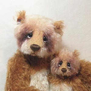 May include: Two plush teddy bears, one brown and one white, are hugging. The brown bear has a light brown face with a pink nose and brown eyes. The white bear has a pink nose and blue eyes. Both bears have a soft, fluffy texture.