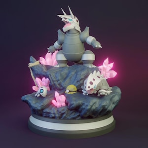 May include: A detailed figurine featuring a gray and white creature with spiky features, standing atop a rocky base with pink crystal formations. A smaller creature and a yellow hard hat are also present. The base has a dark blue and white trim.