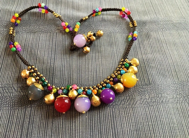 Cute group round gems beads /& brass bell necklace