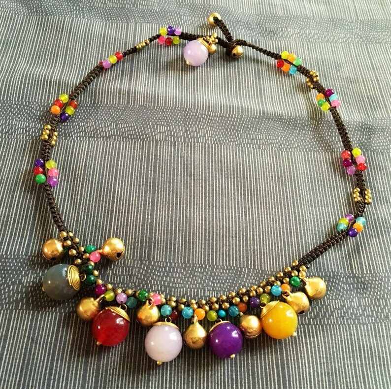 Cute group round gems beads /& brass bell necklace