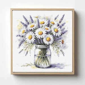 May include: A framed watercolor painting of a bouquet of daisies and lavender in a glass jar. The daisies have white petals and yellow centers, while the lavender is purple. The jar is clear, and the frame is light brown.