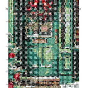 May include: A cross stitch pattern chart titled Christmas shop window, featuring a grid with numbered axes from 60 to 110 and 90 to 170. The design uses various symbols and colors, including red, green, and brown, to depict a festive shop scene.