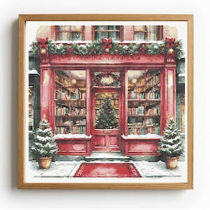 May include: A framed cross-stitch embroidery depicting a red storefront with large glass windows filled with bookshelves. The exterior is decorated with green garlands, red bows, and two potted Christmas trees flanking the entrance door.