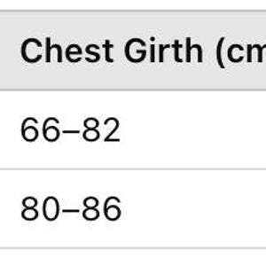 May include: Size chart for sleepwear with measurements in centimeters for sleepwear length, chest girth, and recommended height.