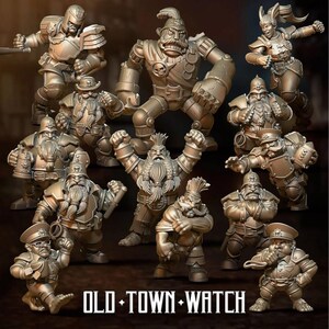 May include: A collection of detailed, metallic-colored miniature figurines of fantasy characters. The figures include dwarves and warriors in various poses, with intricate armor and weaponry. The text "OLD TOWN WATCH" is at the bottom.