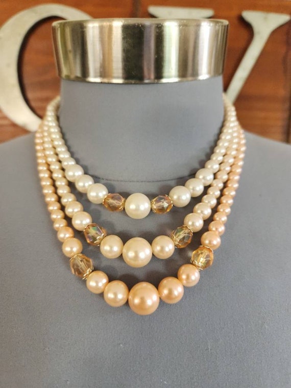 Multi strand faux pearl necklace deals