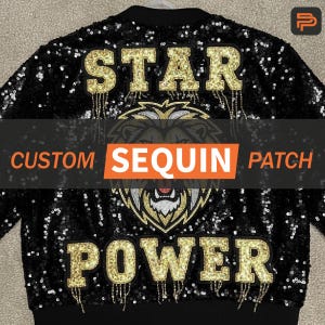 May include: Black sequin jacket with gold embroidered text and a lion design. The jacket features the words "STAR" and "POWER", with "CUSTOM SEQUIN PATCH" printed across the center. The jacket is a bomber style.