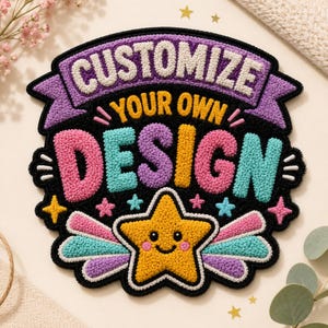 May include: A punch needle wall hanging featuring the text CUSTOMIZE YOUR OWN DESIGN in white and yellow letters against a black background. The piece includes a smiling yellow star with pink cheeks and colorful light blue and purple accents.