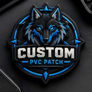 May include: A circular PVC patch featuring a stylized wolf head with black and blue fur and glowing blue eyes. The design includes a compass-like border and the text CUSTOM PVC PATCH in bold white lettering on a black background with blue accents.