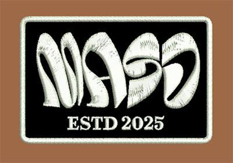 May include: Embroidered patch with the word "MASS" in white, stylized lettering on a black background. The text "ESTD 2025" is below the word. The patch has a white border and a brown background.